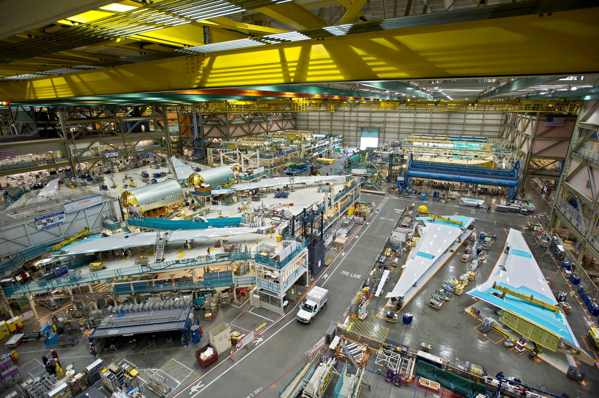 Boeing workers fabricate 777 aircraft in the company's factory.