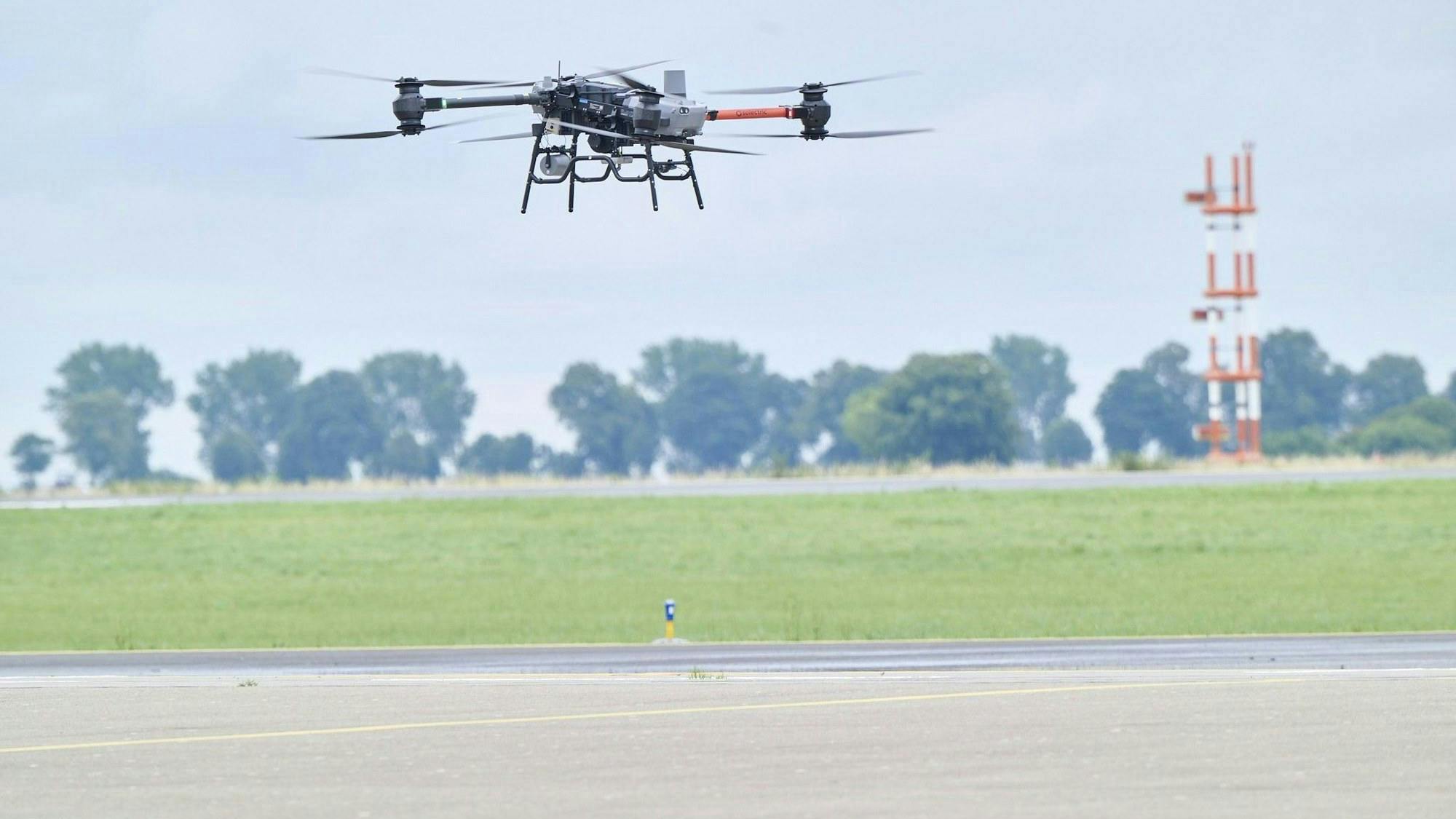 Flight tasks during the 'Offshore Drone Challenge&rsquo; at DLR's National Experimental Test Center for Unmanned Aircraft Systems in Cochstedt are modelled on the transportation of materials to offshore wind farms &ndash; from launching the aircraft to placing a load on a wind turbine. Image Credit: DLR (CC BY-NC-ND 3.0)