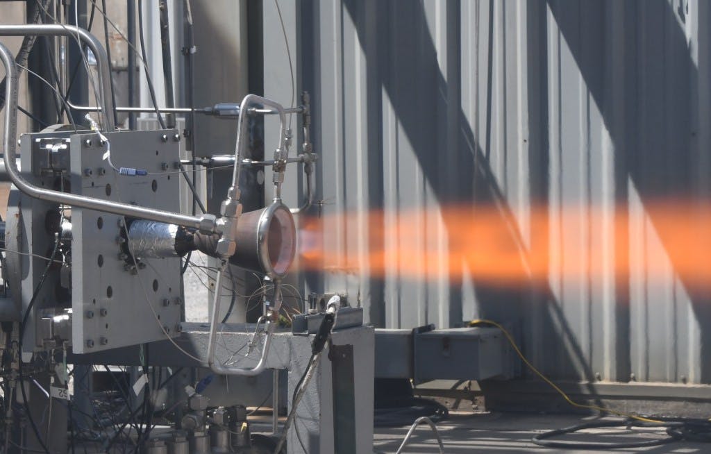 Shown above, during a hot-fire test at NASA's Marshall Space Flight Center in Huntsville, Ala., this 2,000-pound-force coupled thrust chamber assembly features a NASA HR-1 alloy nozzle. NASA photo.
