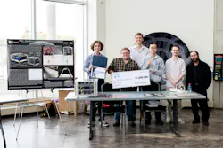 Team H.E.L.P.S. (High Efficiency Long-Range Power Solution) from The University of California, Santa Barbara won the $1 million grand prize in NASA’s Watts on the Moon Challenge. Their team developed a low-mass, high-efficiency cable, and featured energy storage batteries on both ends of their power transmission and energy storage system. Credit: NASA/GRC/Sara Lowthian-Hanna. Team H.E.L.P.S. (High Efficiency Long-Range Power Solution) from The University of California, Santa Barbara won the $1 million grand prize in NASA’s Watts on the Moon Challenge. Their team developed a low-mass, high-efficiency cable, and featured energy storage batteries on both ends of their power transmission and energy storage system. Credit: NASA/GRC/Sara Lowthian-Hanna.