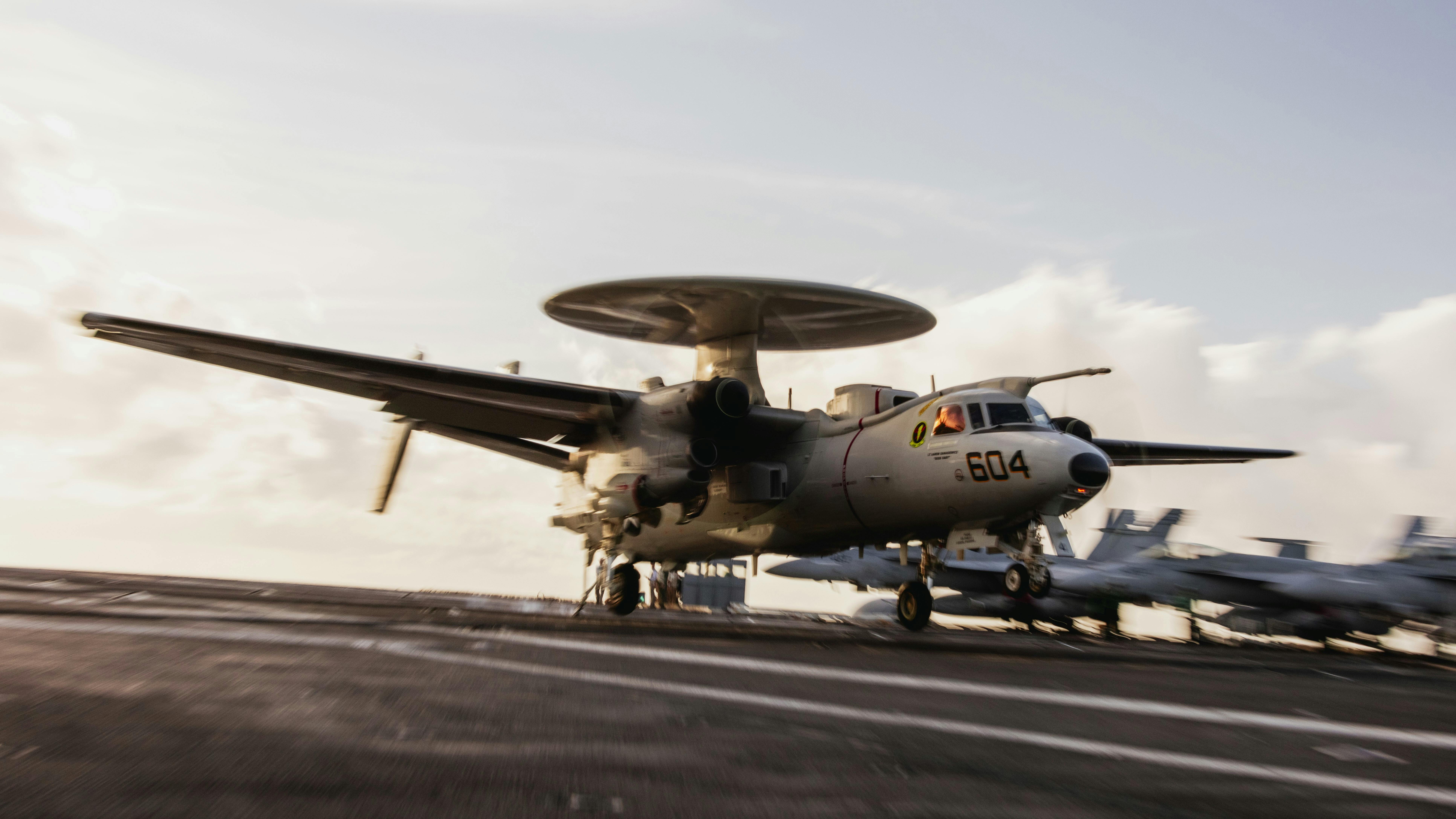 An E-2D Advanced Hawkeye lands on the flight deck of Nimitz-class aircraft carrier USS George Washington (CVN 73) last September.