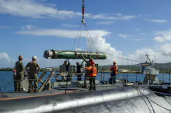 Sailors load a MK 48 torpedo aboard the Los Angeles-class attack submarine USS Annapolis. Sailors load a MK 48 torpedo aboard the Los Angeles-class attack submarine USS Annapolis.