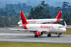 Two Avianca aircraft on the taxiway. Two Avianca aircraft on the taxiway.