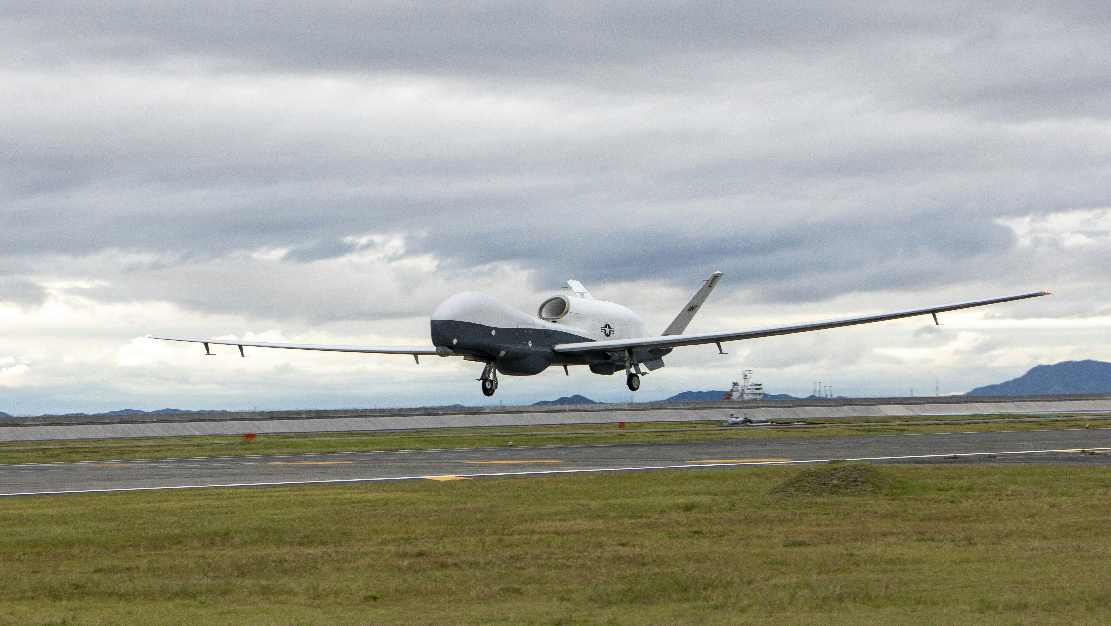 A U.S. Navy MQ-4C assigned to Unmanned Patrol Squadron 19 Triton takes off from the flightline at Marine Corps Air Station Iwakuni, Japan, in 2022.
