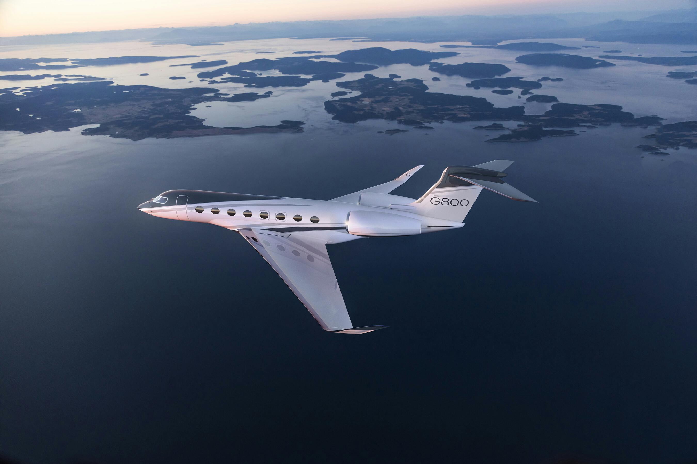 The G800 flying over a body of water and some islands.