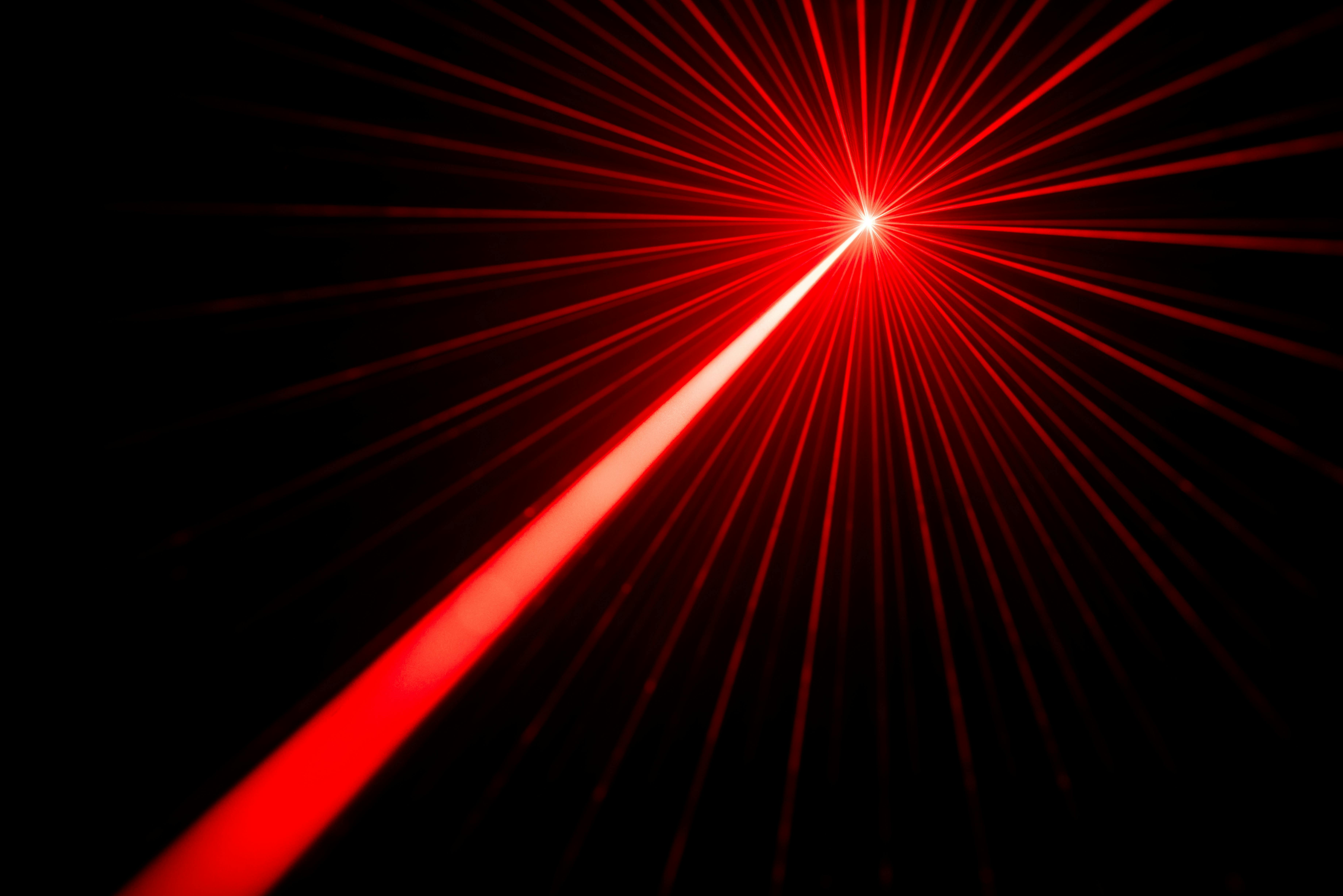 a red laser among a black background