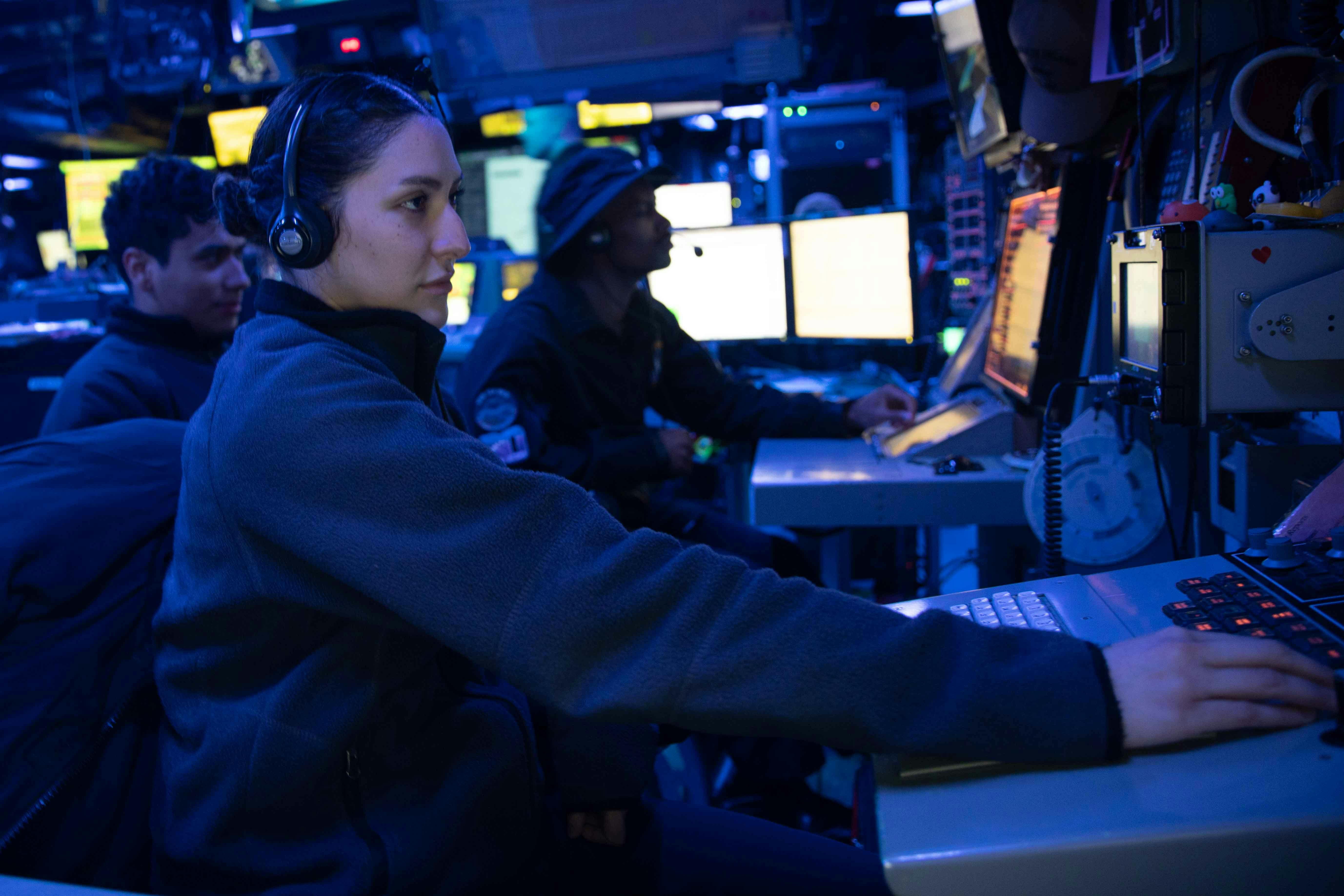 A U.S. Navy Cryptologic Technician monitors shipboard sensors aboard the amphibious assault ship USS Makin Island (LHD 8). Cryptologic technicians conduct electronic warfare by operating and maintaining electronic sensors and computer systems in accordance with fleet and national tasking. U.S. Navy photo