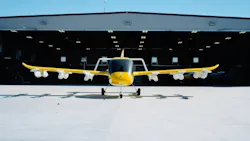 A photo of a Wisk Aero aircraft outside a hangar A photo of a Wisk Aero aircraft outside a hangar