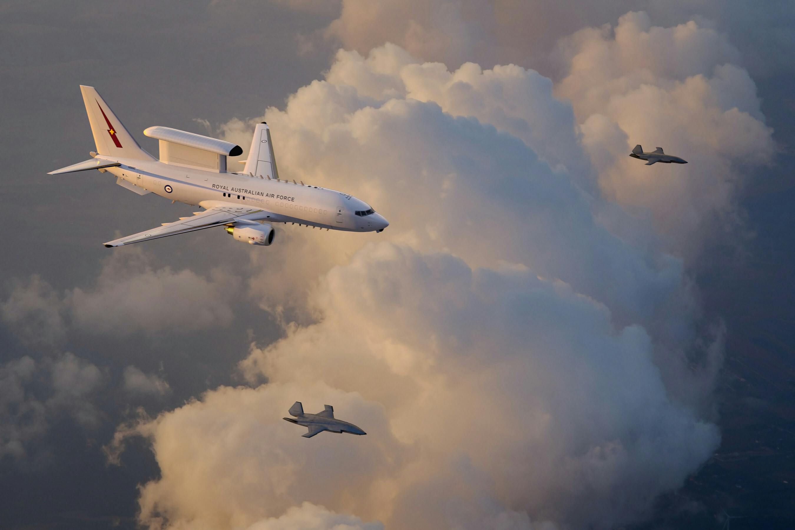 An artist&rsquo;s rendering of a Royal Australian Air Force E-7A Wedgetail teaming with two MQ-28 Ghost Bat collaborative combat aircraft. Boeing illustration.