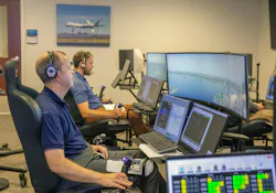 Andy Burroughs (left) and Paul Friz in the roles of air taxi pilots running through air taxi integration simulations focusing on urban air space at NASA’s Langley Research in Hampton, Virginia on 25 Sept. 2024. NASA photo. Andy Burroughs (left) and Paul Friz in the roles of air taxi pilots running through air taxi integration simulations focusing on urban air space at NASA’s Langley Research in Hampton, Virginia on 25 Sept. 2024. NASA photo.