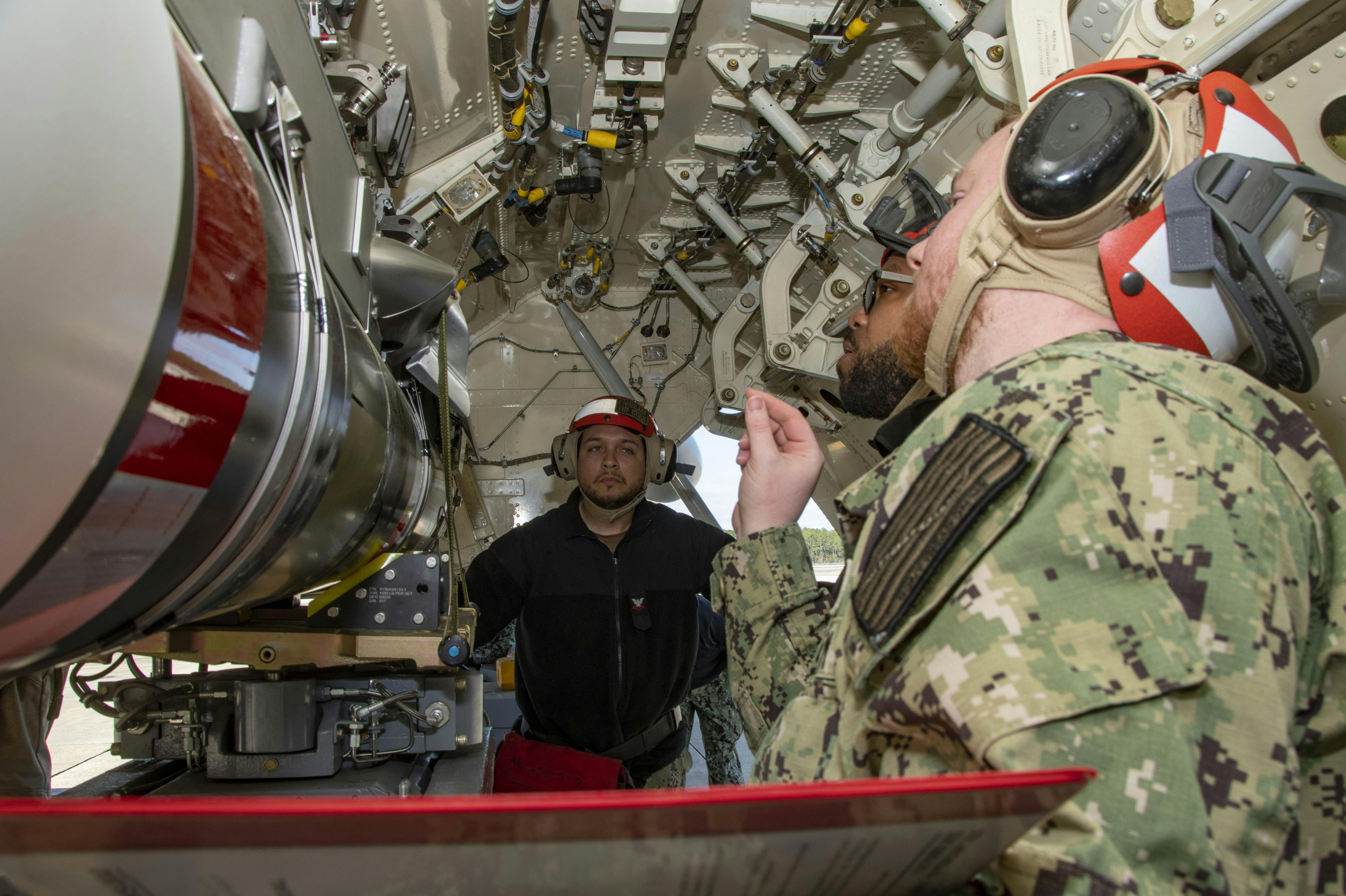 Sailors prepare to load a High Altitude Anti-submarine Warfare Capability (HAAWC) weapon to a P-8A Poseidon maritime patrol aircraft last February.