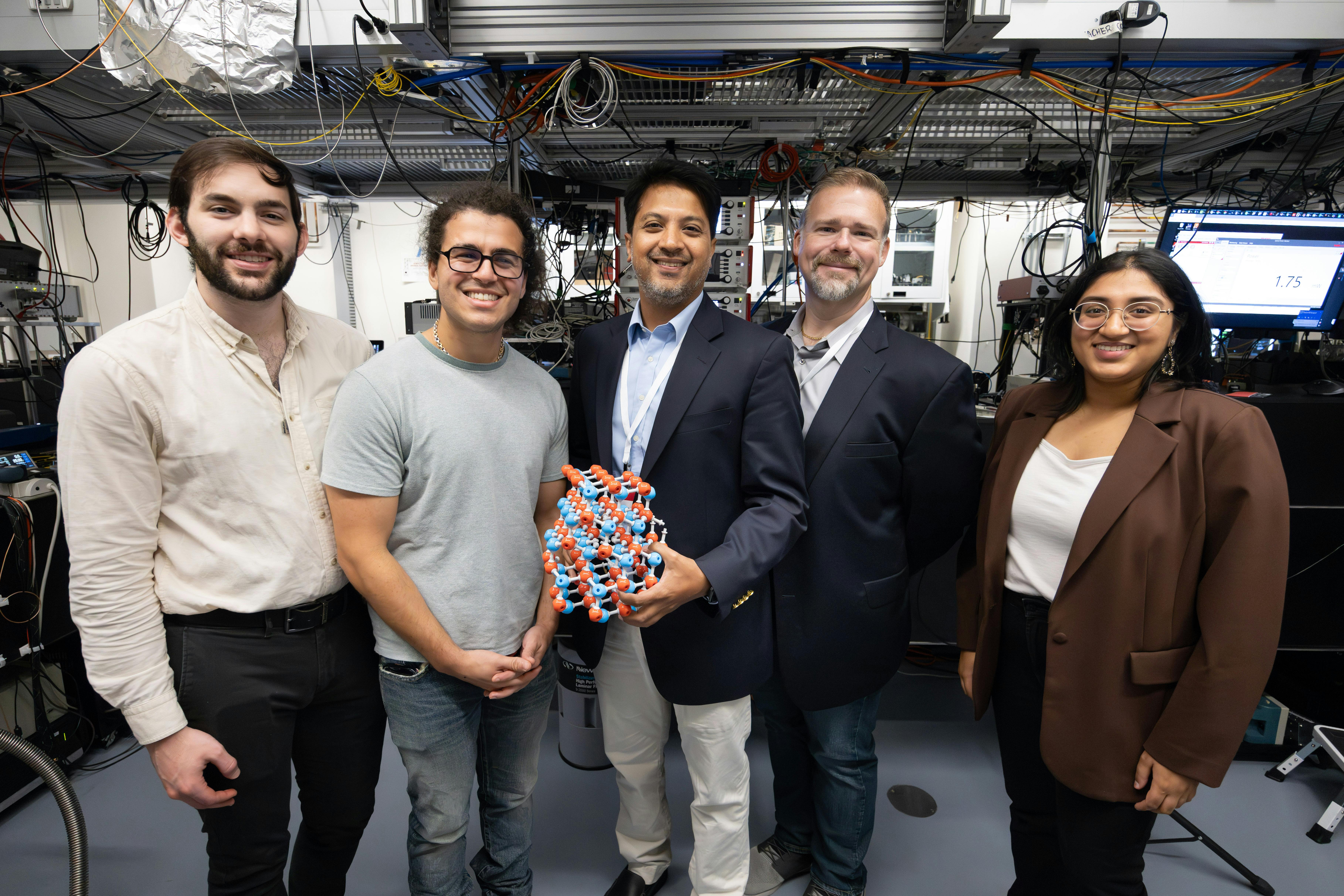 Gaurav Dhamija (center), Senior Director Of Technology And Strategy At Belden, And Tim Waters (second From Right), Architecture And Technology At Belden, Visit The Laboratory Of David Awschalom At The University Of Chicago&rsquo;s Pritzker School Of Molecular Engineering Leading The Tour Were (from Left) Graduate Student Jos&eacute; A M&eacute;ndez M&eacute;ndez, Postdoctoral Scholar Cyrus Zeledon, And Graduate Student Swathi Chandrika (image By Anne Ryan For The Cqe)