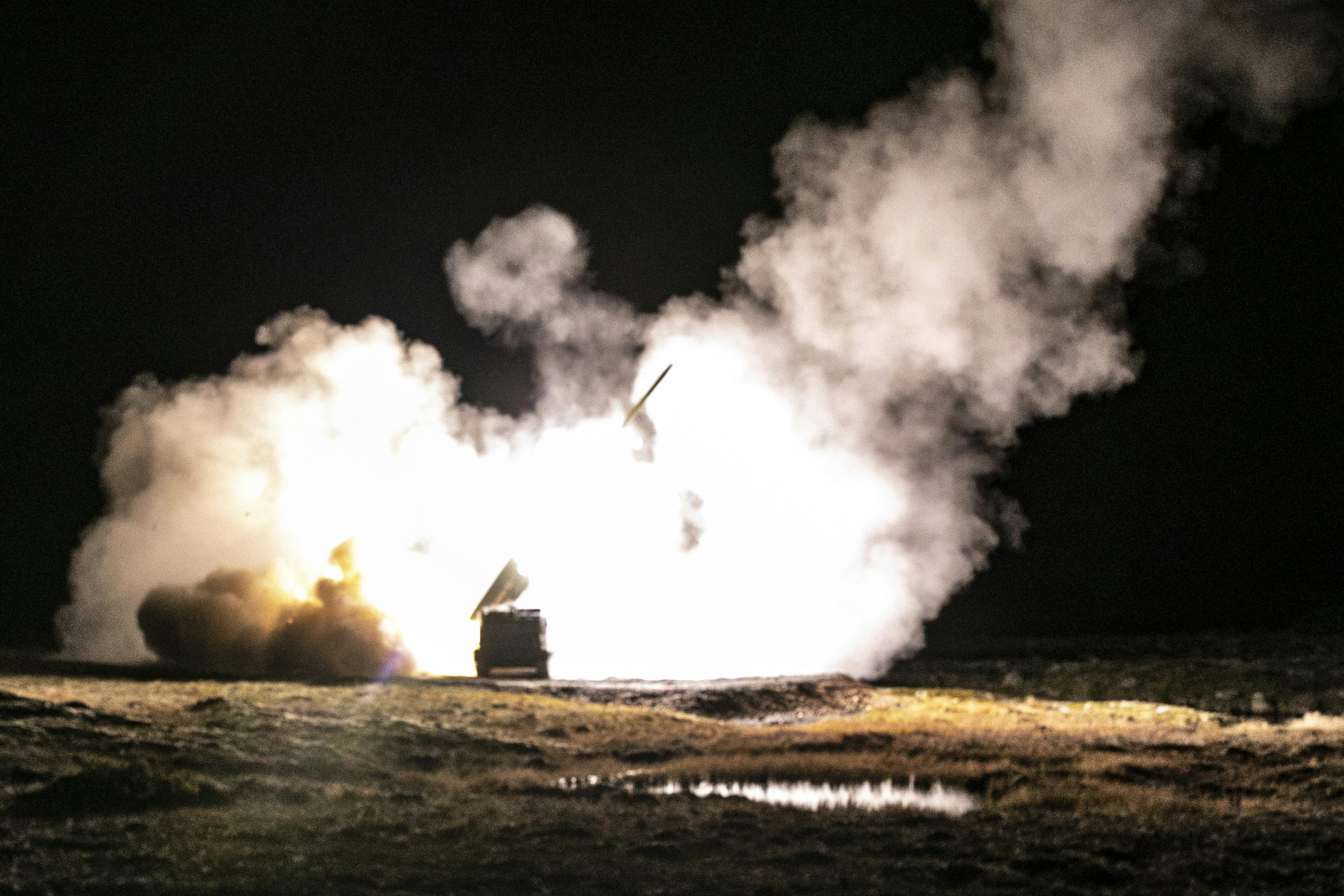 Artillery soldiers fire M31 Guided Multiple Launch Rocket Systems from their M270A1 MLRS during the Thunder Cloud live-fire exercise in Andoya, Norway in September 2021.