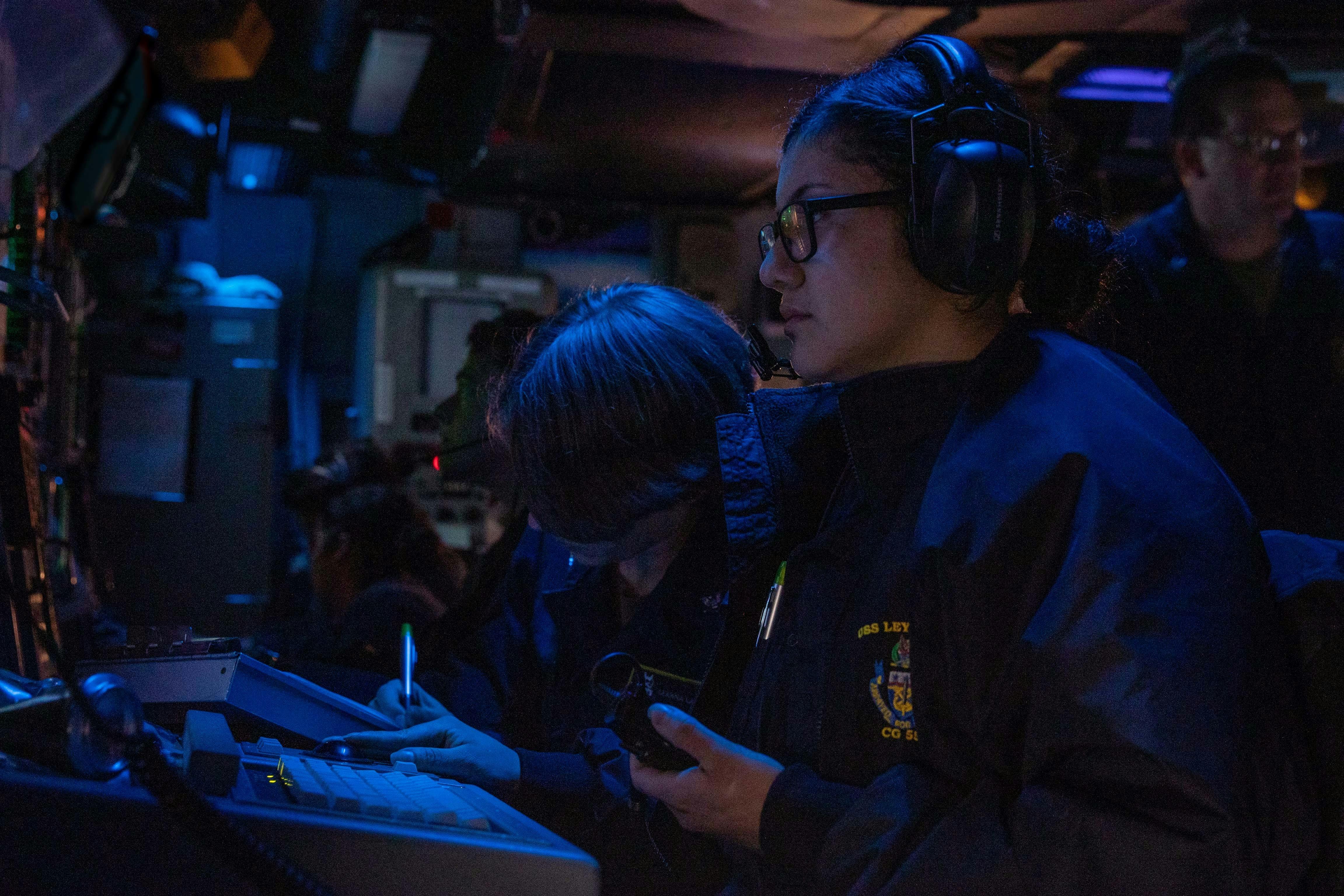A Navy surface sonar technician stands sonar watch aboard the Ticonderoga-class guided-missile cruiser USS Leyte Gulf (CG 55) in 2022.