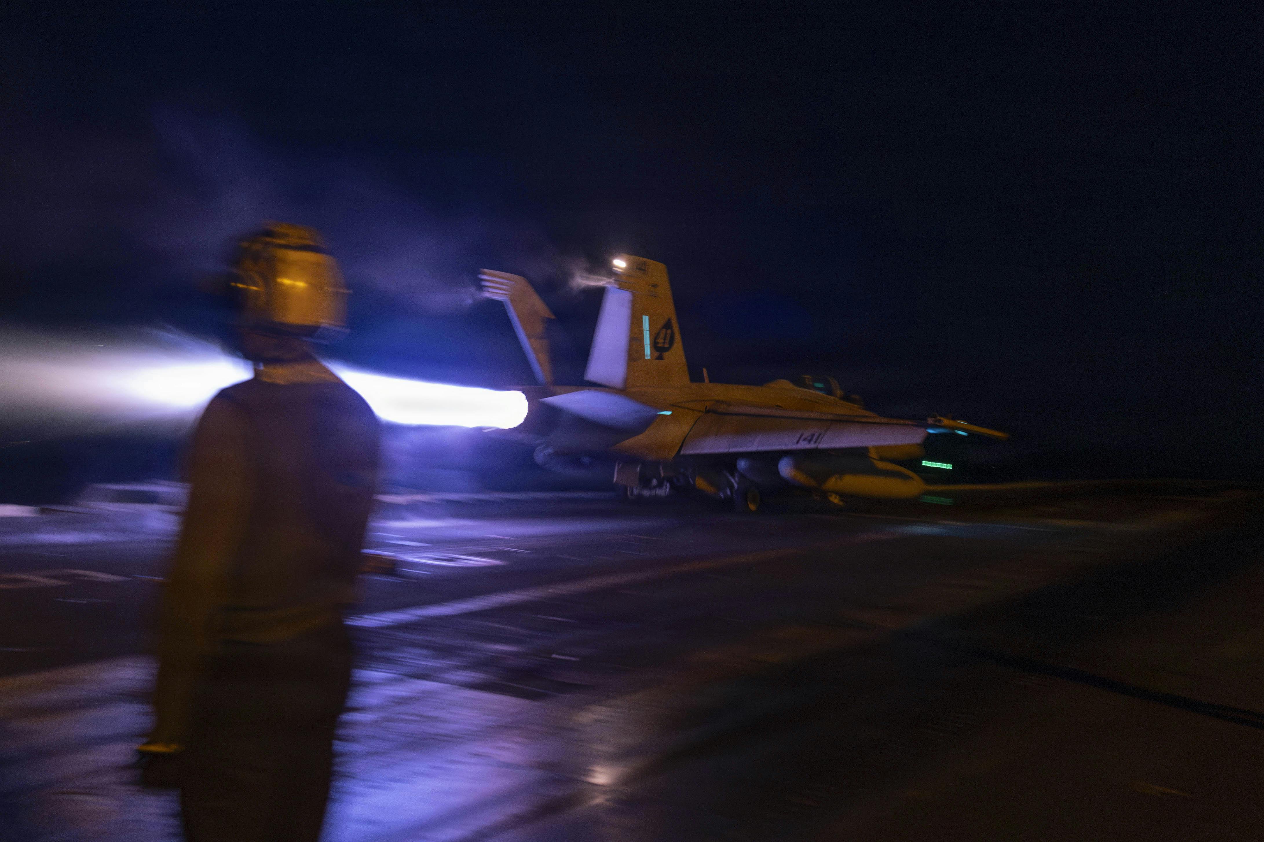 An F/A-18F Super Hornet jet fighter-bomber attached to Navy Strike Fighter Squadron (VFA) 41, launches from the flight deck of Nimitz-class aircraft carrier USS Abraham Lincoln (CVN 72) in support of Operation Epic Fury last Sunday.