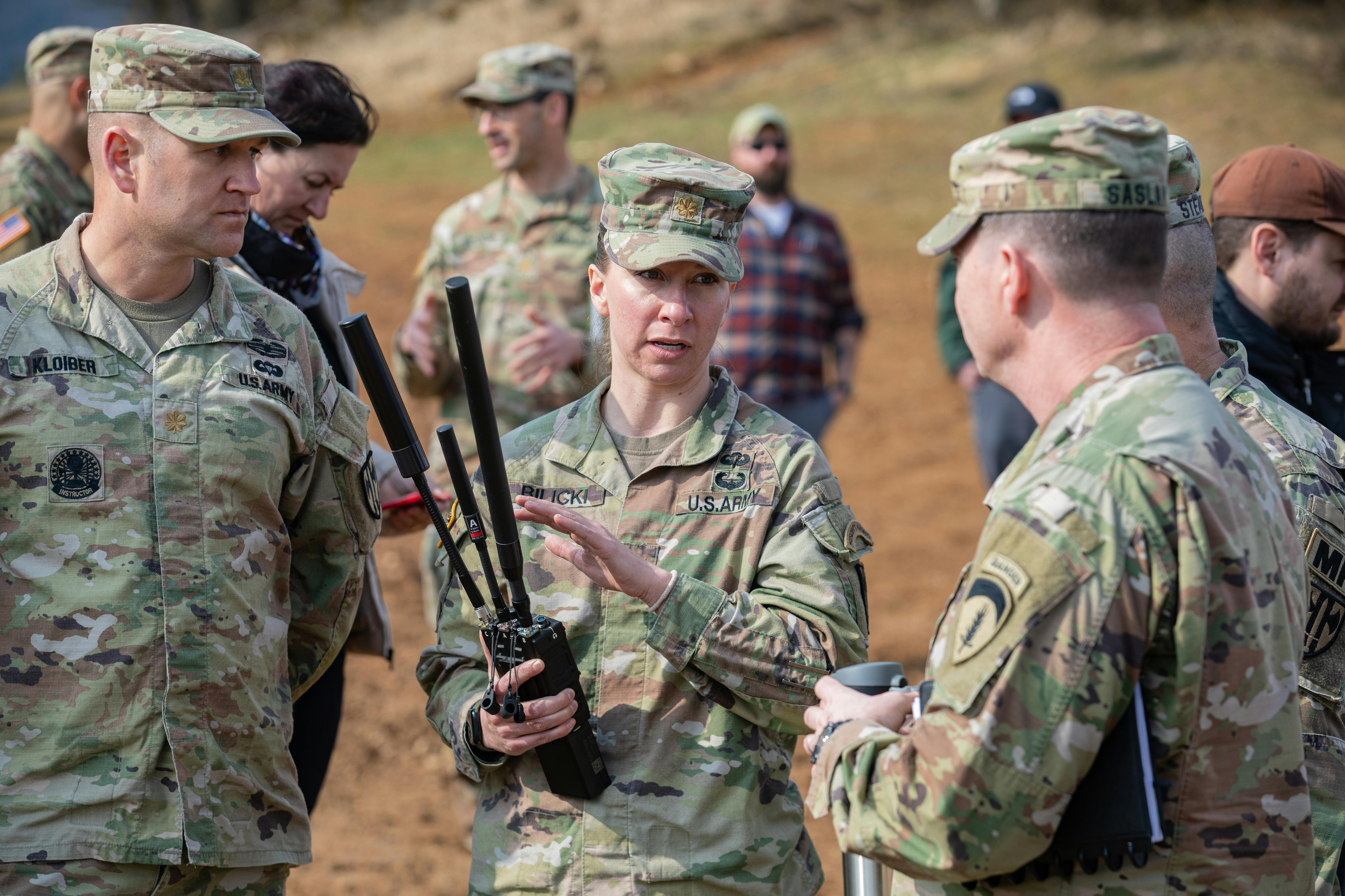 U.S. Army counter-uncrewed experts discuss electronic warfare and counter-uncrewed aircraft technologies with the German National Radio Frequency Agency in March 2025.