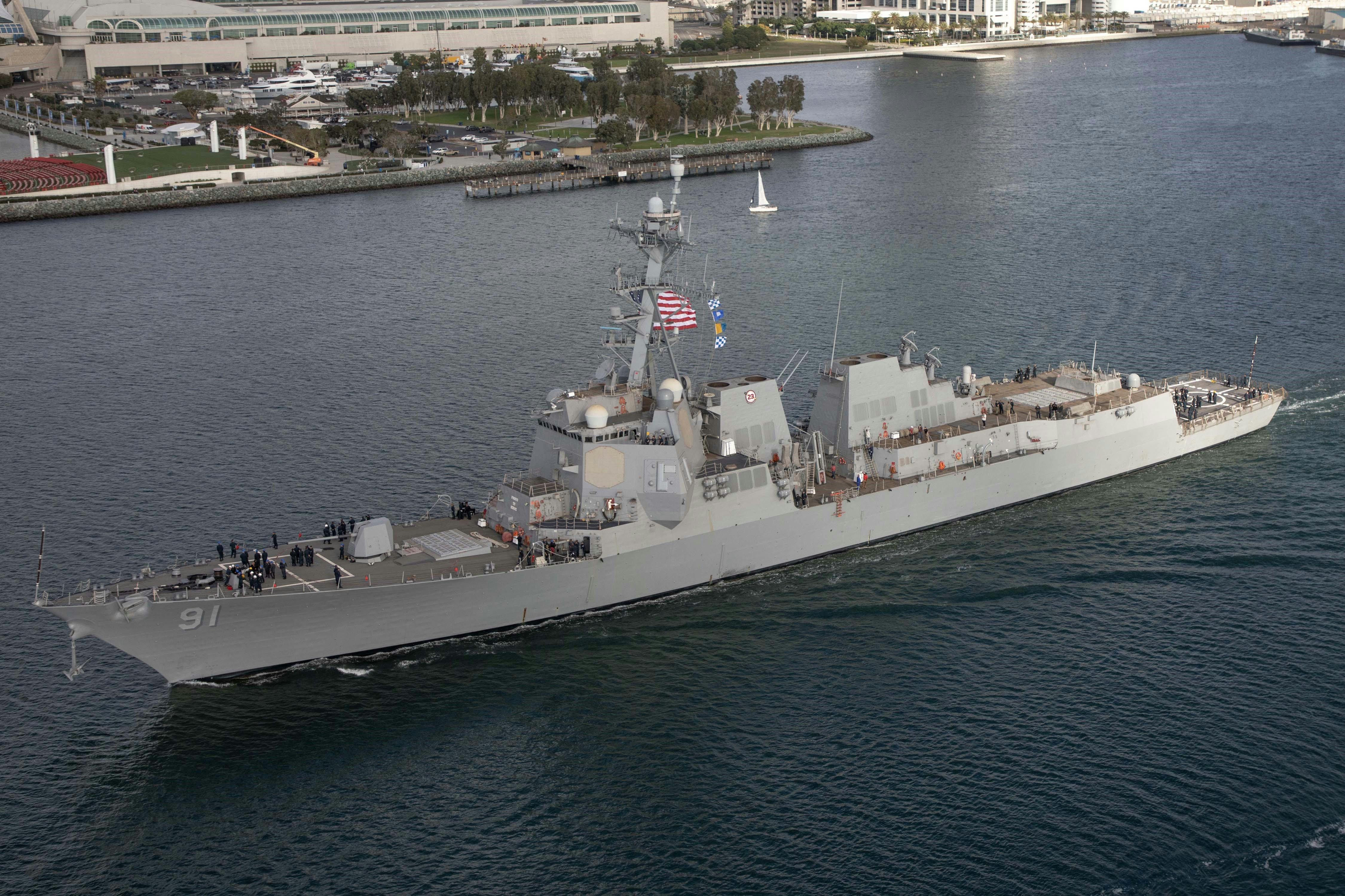 The USS Pinckney in harbor as seen from the sky.