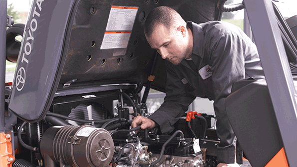 A Prolift associate at Toyota Material Handling USA Inc services a lift truck
