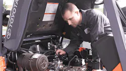 A Prolift associate at Toyota Material Handling USA Inc services a lift truck A Prolift associate at Toyota Material Handling USA Inc services a lift truck