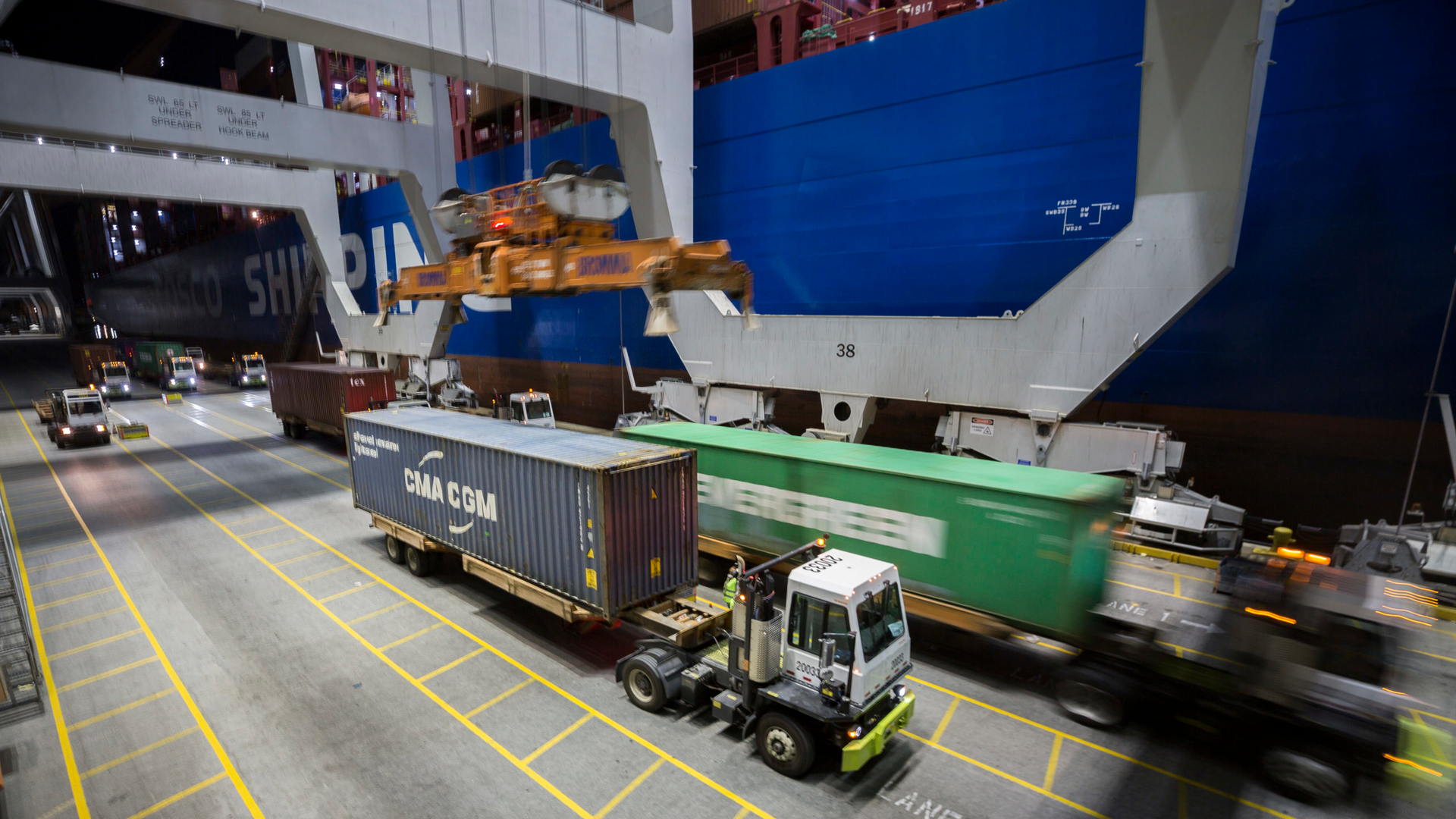 Crews work the COSCO Rose at the Port of Savannah&rsquo;s Garden City Terminal. The terminal handled 4.44 million twenty-foot equivalent container units in FY2020