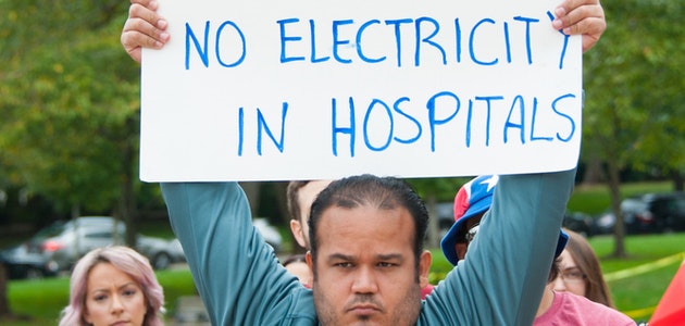 Protest following Hurricane Maria. By Rena Schild/Shutterstock.com