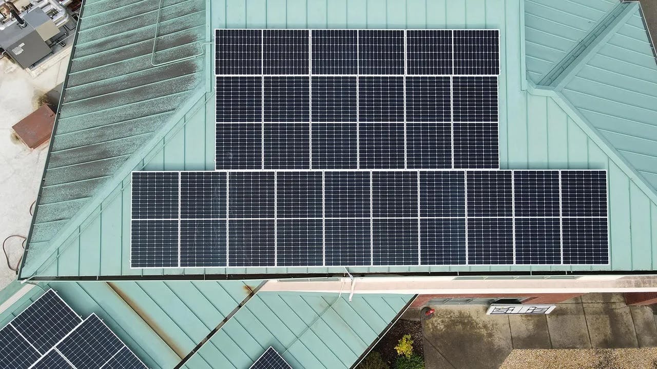 Solar panels cover portions of the roofline at Alliance Medical Center in Healdsburg, California. The resilient power system, which also includes battery storage, was funded by Direct Relief's Power for Health program, and the system has the ability to power the health center for up to 15 hours during a power outage. (Courtesy photo)