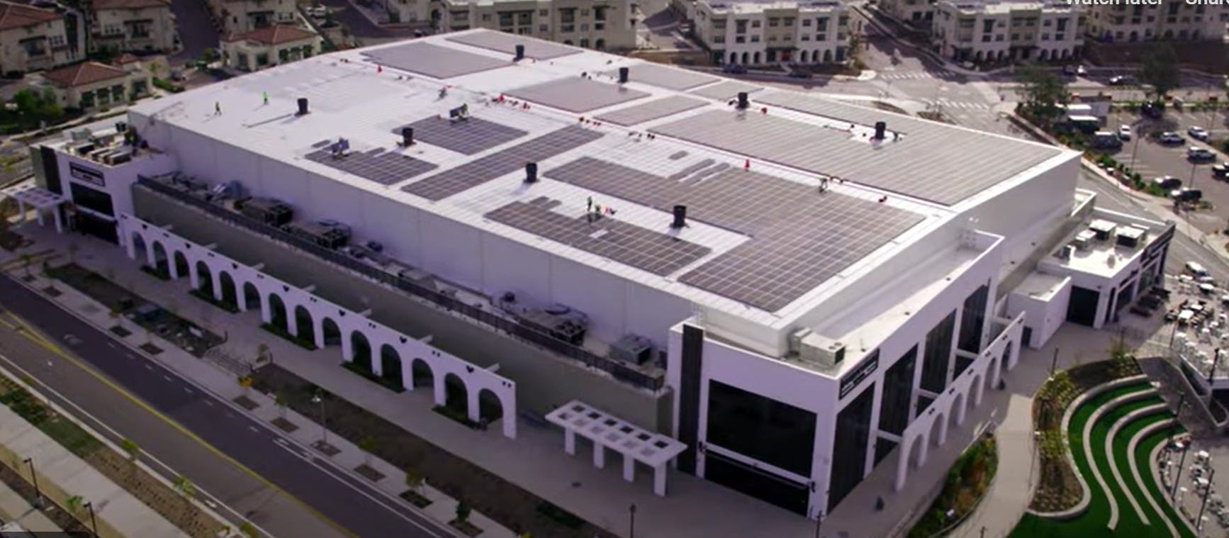 Aerial for the Frontwave Arena rooftop solar array. Image credit Mayfield Renewables via Youtube