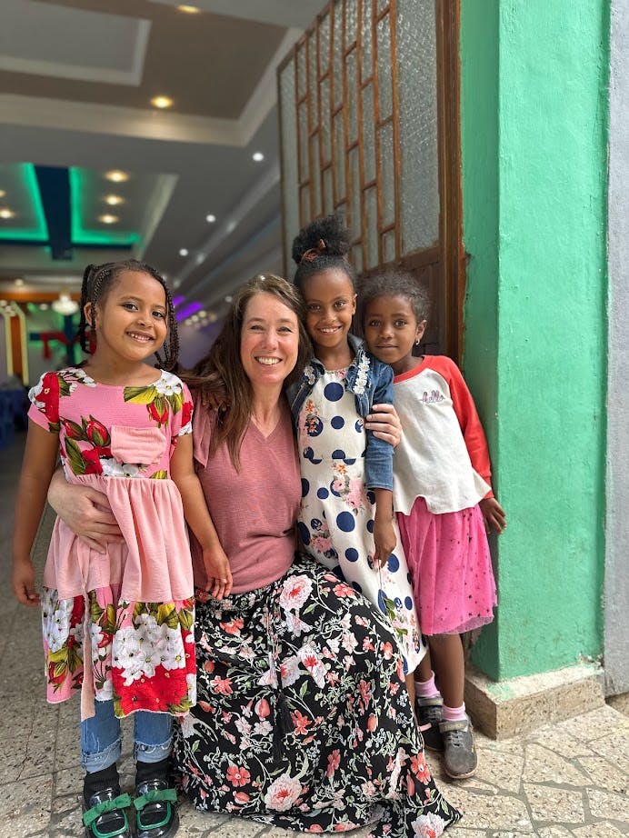 Tami Peters with children of Kombulcha, Ethiopia.