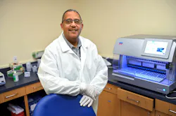 Staff member getting ready for a day of testing. Staff member getting ready for a day of testing.