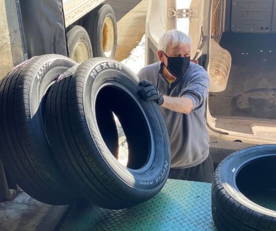 Allen-Rubber-unloading-tires-shot-resized