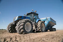 1672950444226 Titanbluenewholland Tractorwithtowed Wagonresized 1672950444226 Titanbluenewholland Tractorwithtowed Wagonresized