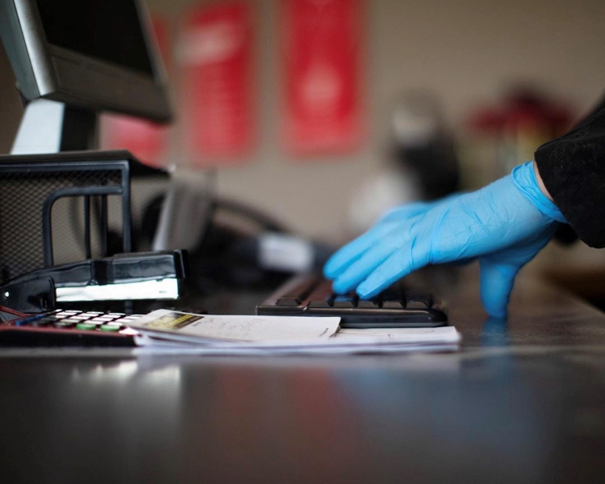 1673020797939 Covid19dealerstoryintrocollagephotoglovedhandatcounter