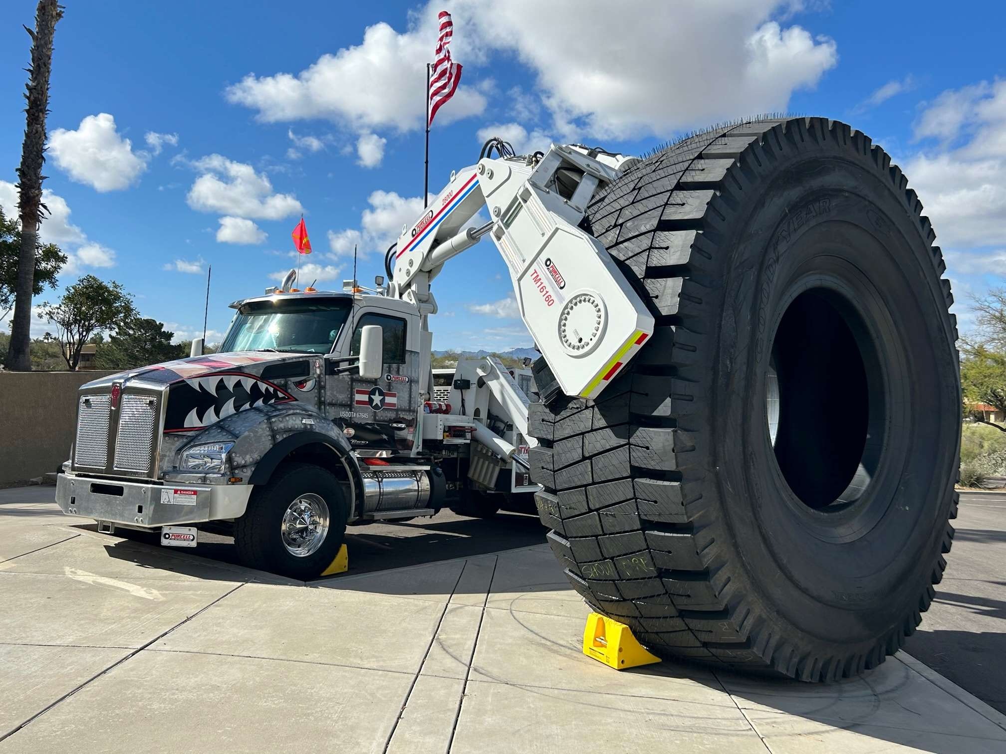 OTR Tire Conference attendees were greeted by a Stellar Industries-built boom truck owned by Purcell Tire & Rubber Co. holding a new 63-inch tire made by Goodyear Tire & Rubber Co.