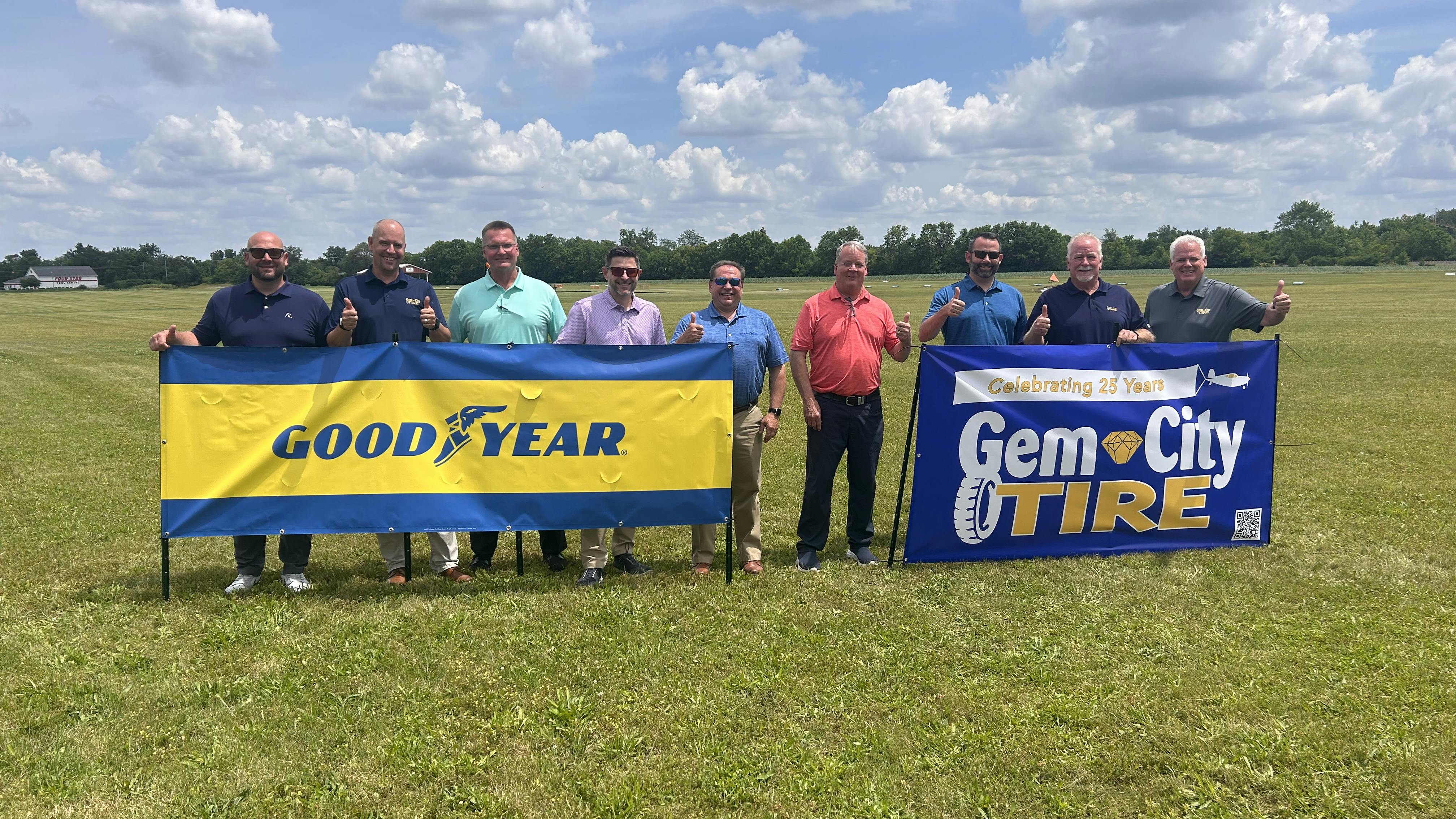 Jeff Lecklider, owner and president of Dayton, Ohio-based Gem City Tire (second from right) says he and his company are selling more than just truck tires. Their real job is to reduce customers' cost-per-mile.