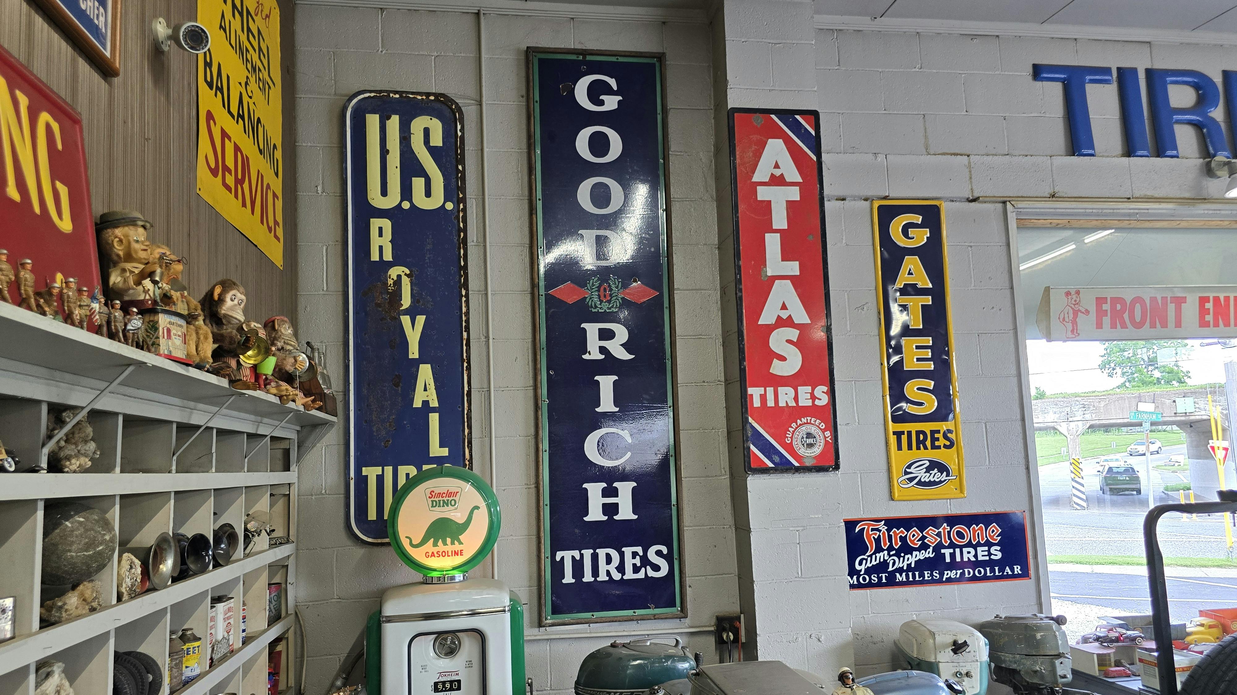 Greg Gustafson, owner of Fremont Tire & Cycle in Galesburg, Ill., displays an array of tire and automobile industry collectibles in the showroom of his dealership.