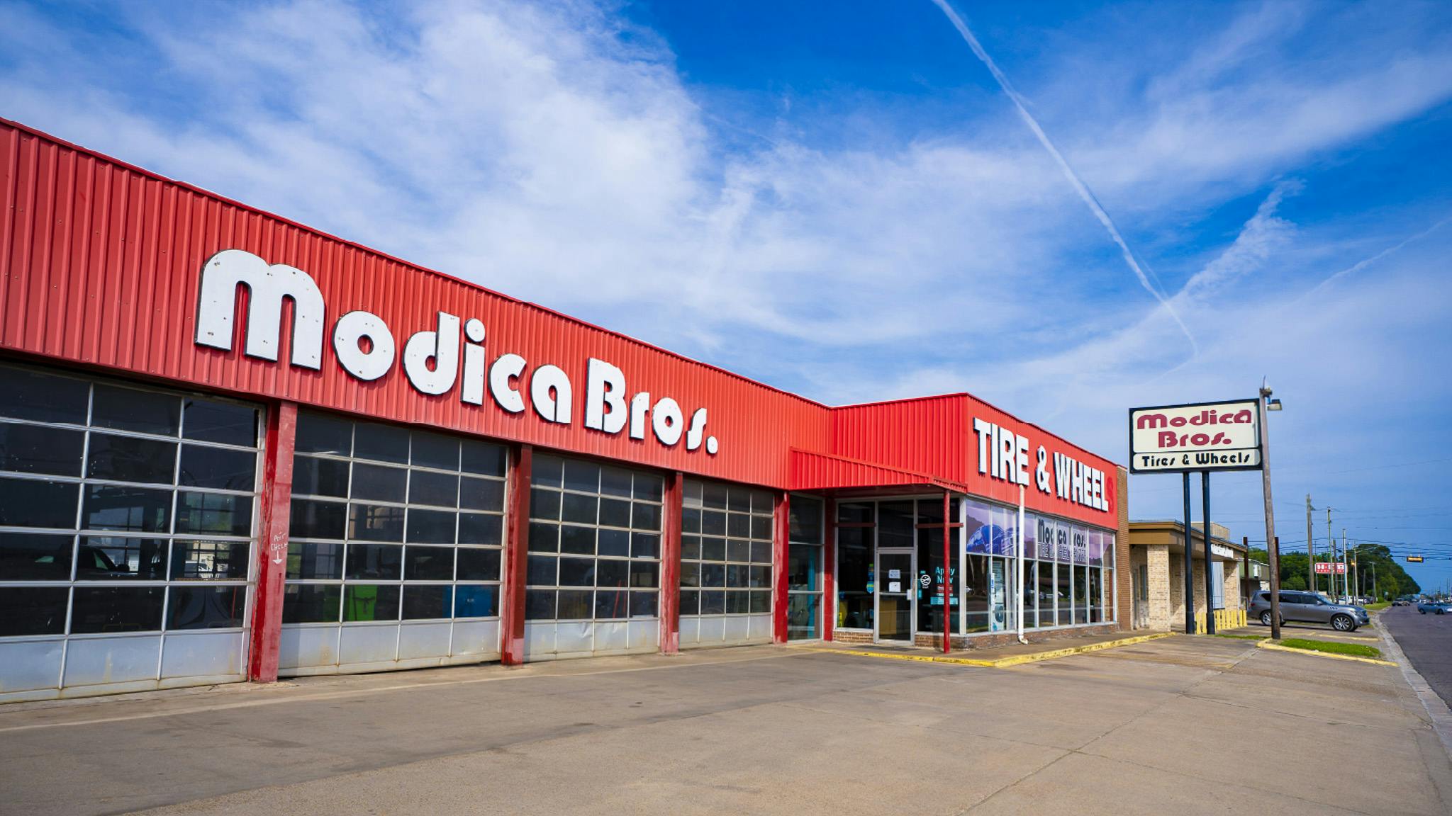 'Our strategy is to find strong local brands and shops and carry that legacy forward,' says Parham Parastaran, CEO of Champaign, Ill.-based Left Lane Auto LLC, which operates under a variety of names, including Modica Bros Tire & Wheel.