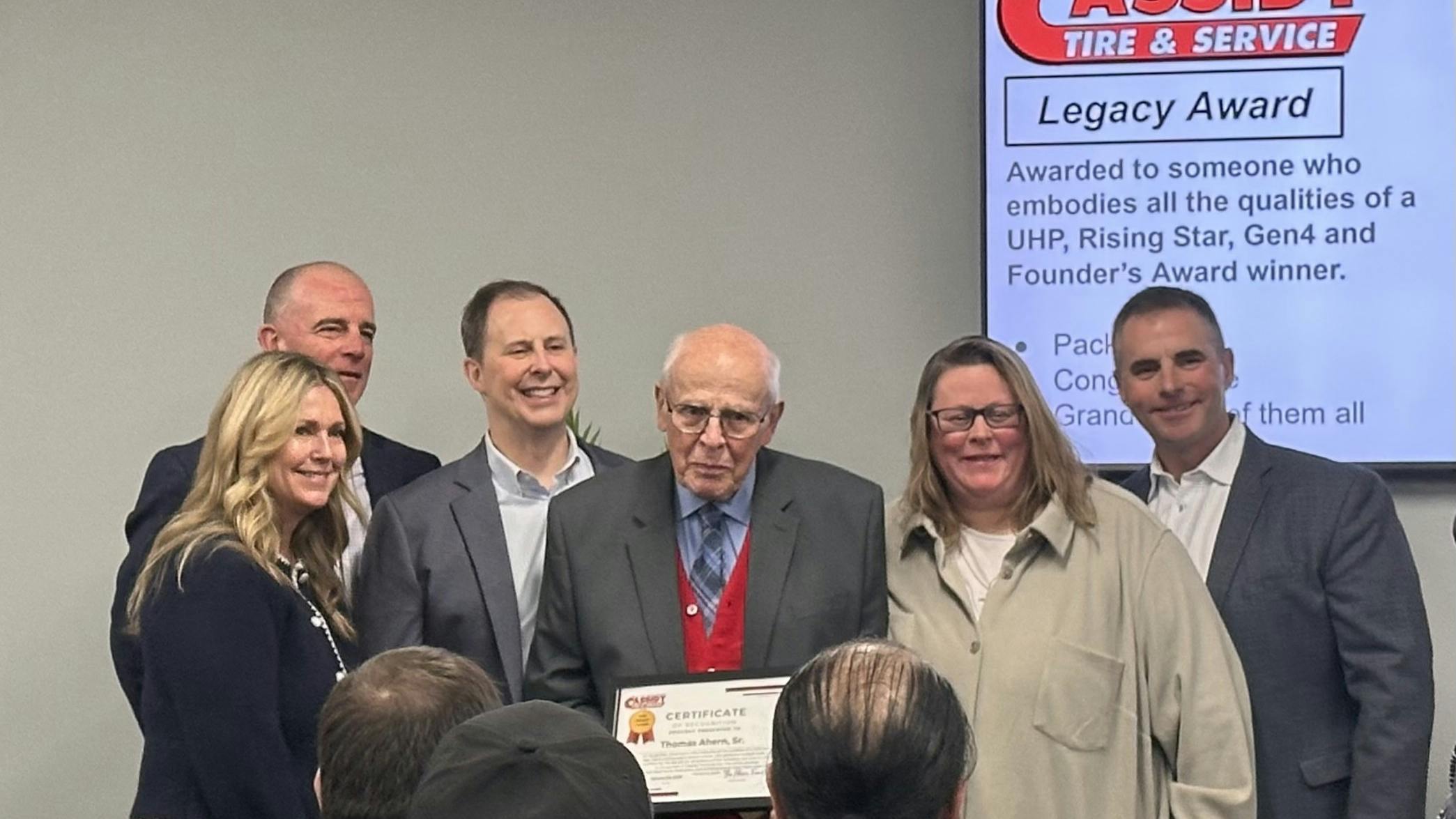 Tom Ahern Sr. (center) was recently honored with the Cassidy Tire Legacy Award.