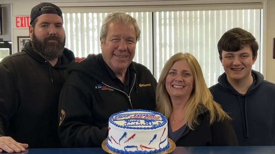 The Gallogly family (from left): Joe Gallogly Jr., Joe Gallogly, Kat Gallogly and James Gallogly celebrated the dealership's 89th anniversary at the shop last year.