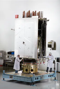 Two engineers from Lockheed Martin prepare the first GPS III satellite for systemlevel testing at the companyrsquos Denverarea satellite facility earlier this year Image courtesy of Lockheed Martin Two engineers from Lockheed Martin prepare the first GPS III satellite for systemlevel testing at the companyrsquos Denverarea satellite facility earlier this year Image courtesy of Lockheed Martin