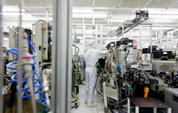 An Infineon Technologies adjusts equipment in a semiconductor cleanroom in Dresden Germany Image courtesy of Infineon An Infineon Technologies adjusts equipment in a semiconductor cleanroom in Dresden Germany Image courtesy of Infineon