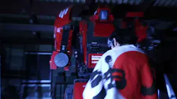 Kogoru Kurata stands before his high-tech mech, Kuratas. Kogoru Kurata stands before his high-tech mech, Kuratas.