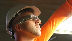 Worker in hardhat wearing xoeye smart glasses Worker in hardhat wearing xoeye smart glasses