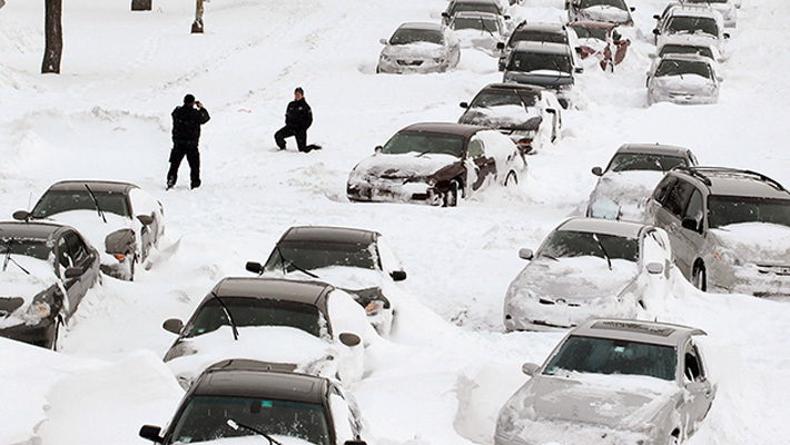 Rows of cars are stalled on Lake Shore Drive during a Chicago blizzard.