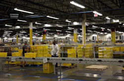 Workers-Packing-Yellow-Bins-In-Factory Workers-Packing-Yellow-Bins-In-Factory