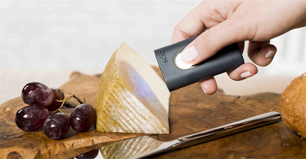 Scanning cheese on cutting board