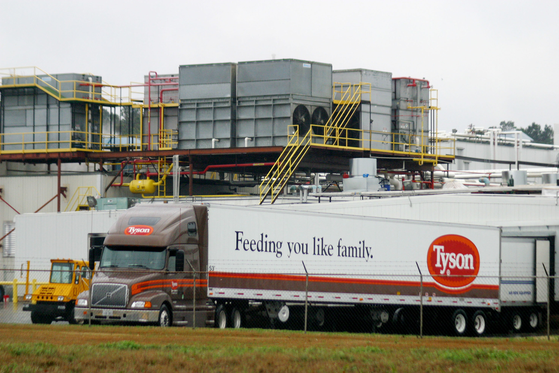 Tyson foods truck driving away from plant