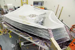 Photo of the fully deployed sunshield in the Northrop Grumman cleanroom. Photo of the fully deployed sunshield in the Northrop Grumman cleanroom.