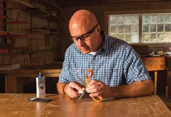 Man Sharpening Scissors Man Sharpening Scissors