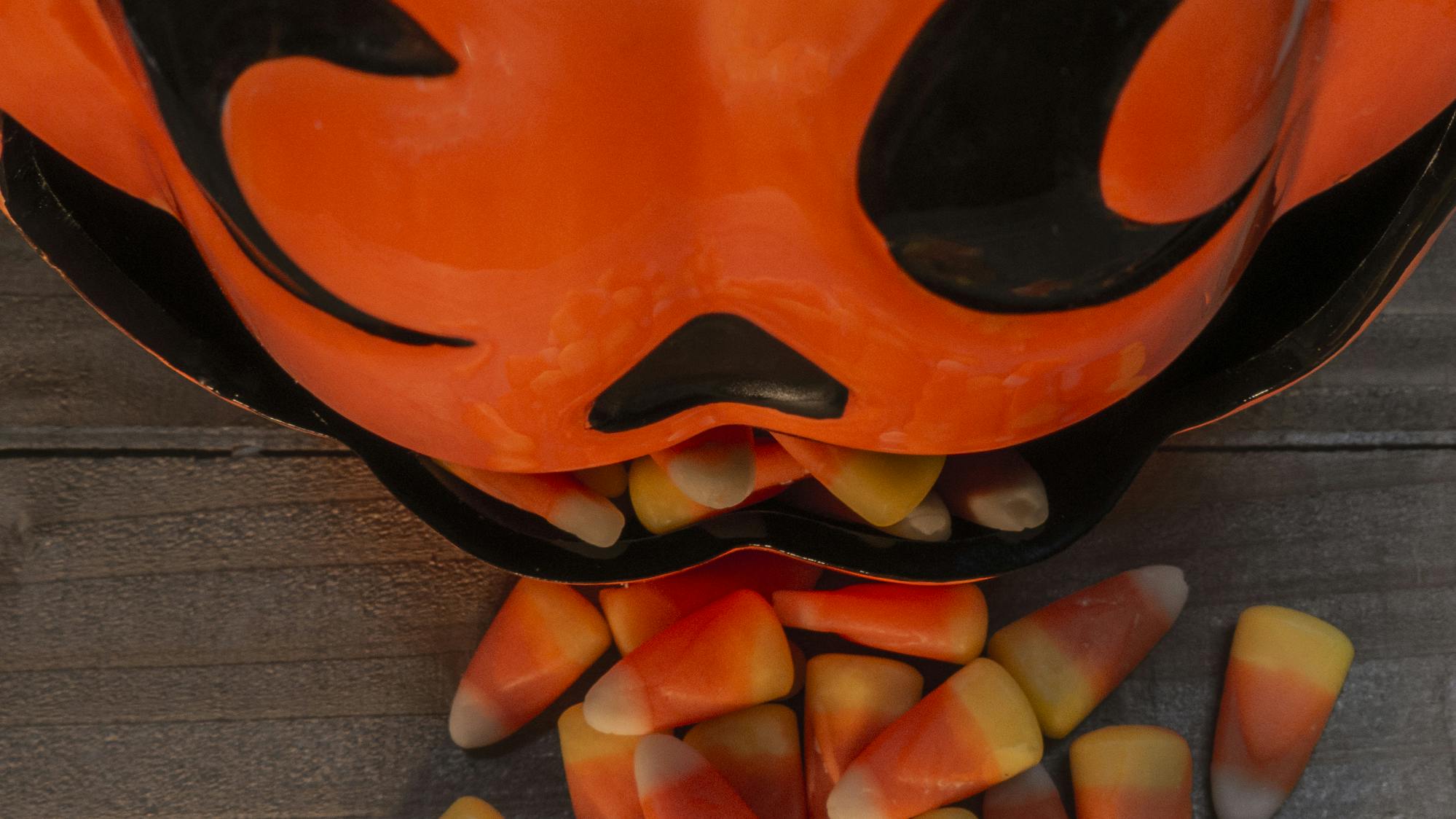 Ceramic Pumpkin Candy Dish With Candy Corn Spilling Out