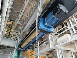 22,000-pound SWL electric-powered wire-rope hoist unit lifted into final position at a 196-foot height. 22,000-pound SWL electric-powered wire-rope hoist unit lifted into final position at a 196-foot height.